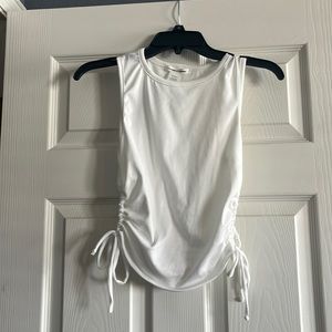 Small caution to the wind tank top